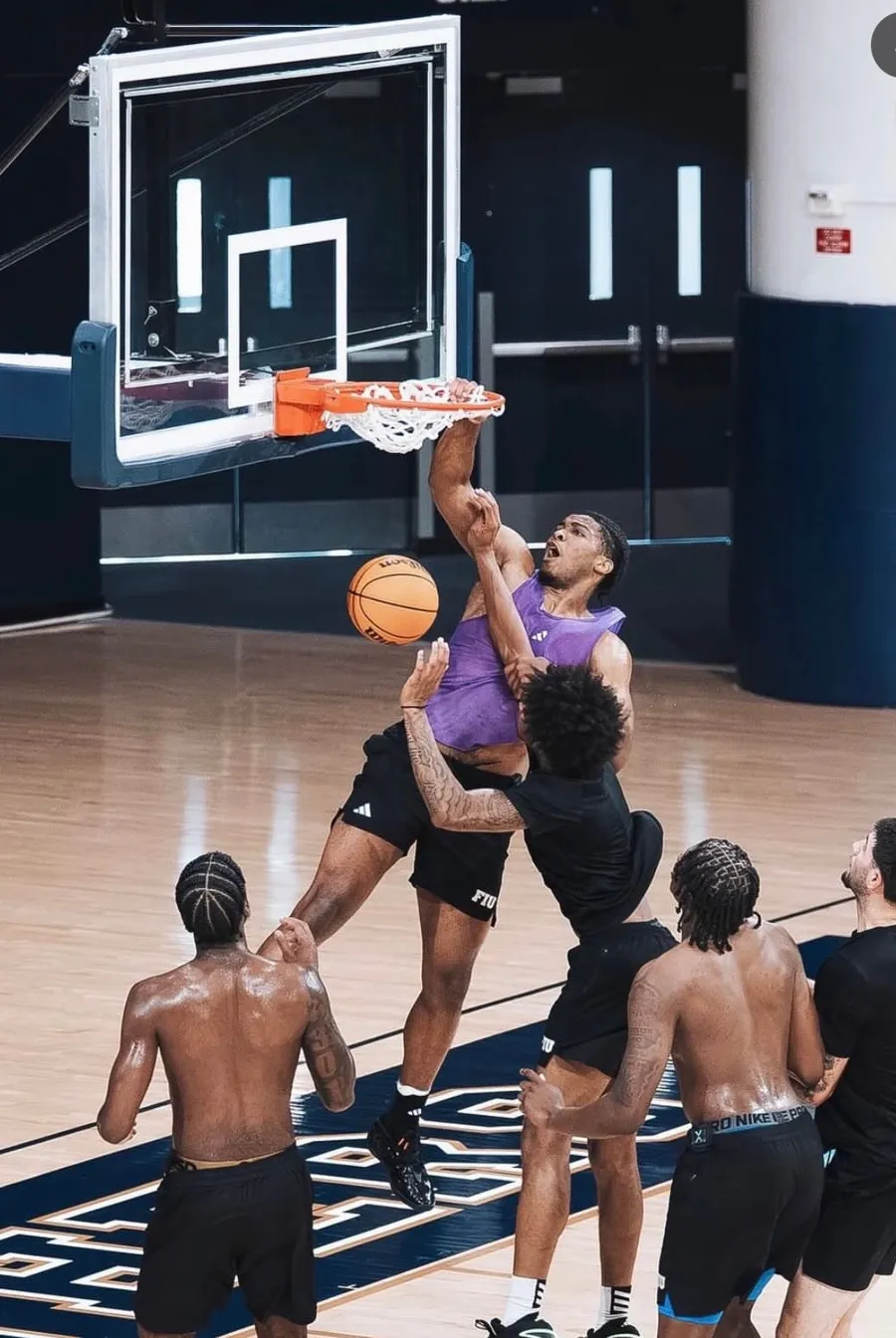 Ramone Seals finishing at the rim during a player development session